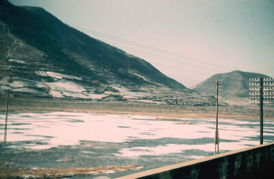 A mountain and a river in winter